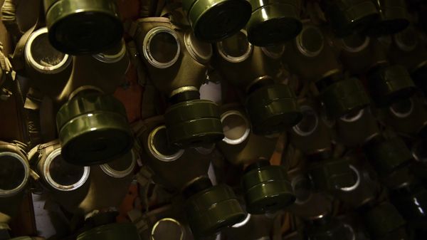 FILE - Gas masks hang on the wall at the Rock Nuclear Bunker Museum in Budapest, Hungary. - Sputnik International