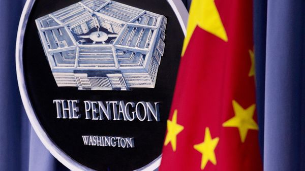 China's national flag is displayed next to the Pentagon logo at the Pentagon, Monday, May 7, 2012.  - Sputnik International