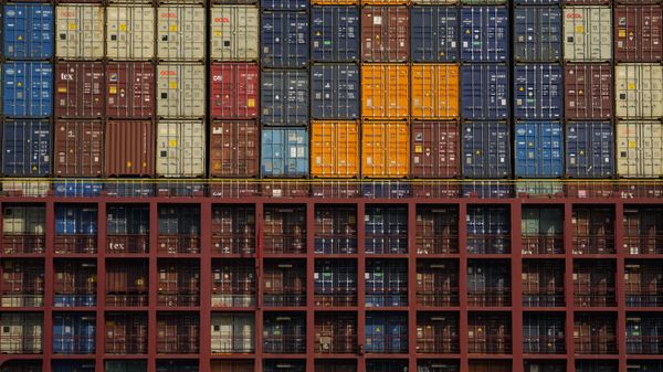 FILE - Containers are stacked on a cargo ship moving through the Panama Canal's Cocoli locks in Panama City, Feb. 21, 2025.  - Sputnik International