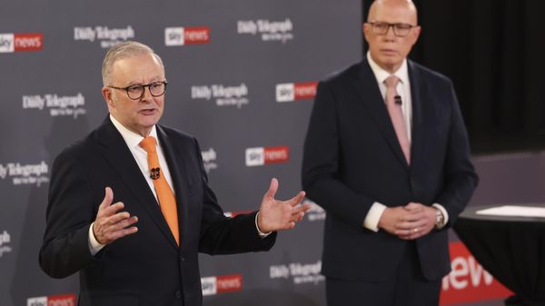 Australian Prime Minister Anthony Albanese, left, gestures as Opposition leader Peter Dutton watches during their TV debate in Sydney, Australia, Tuesday, April 8, 2025 - Sputnik International