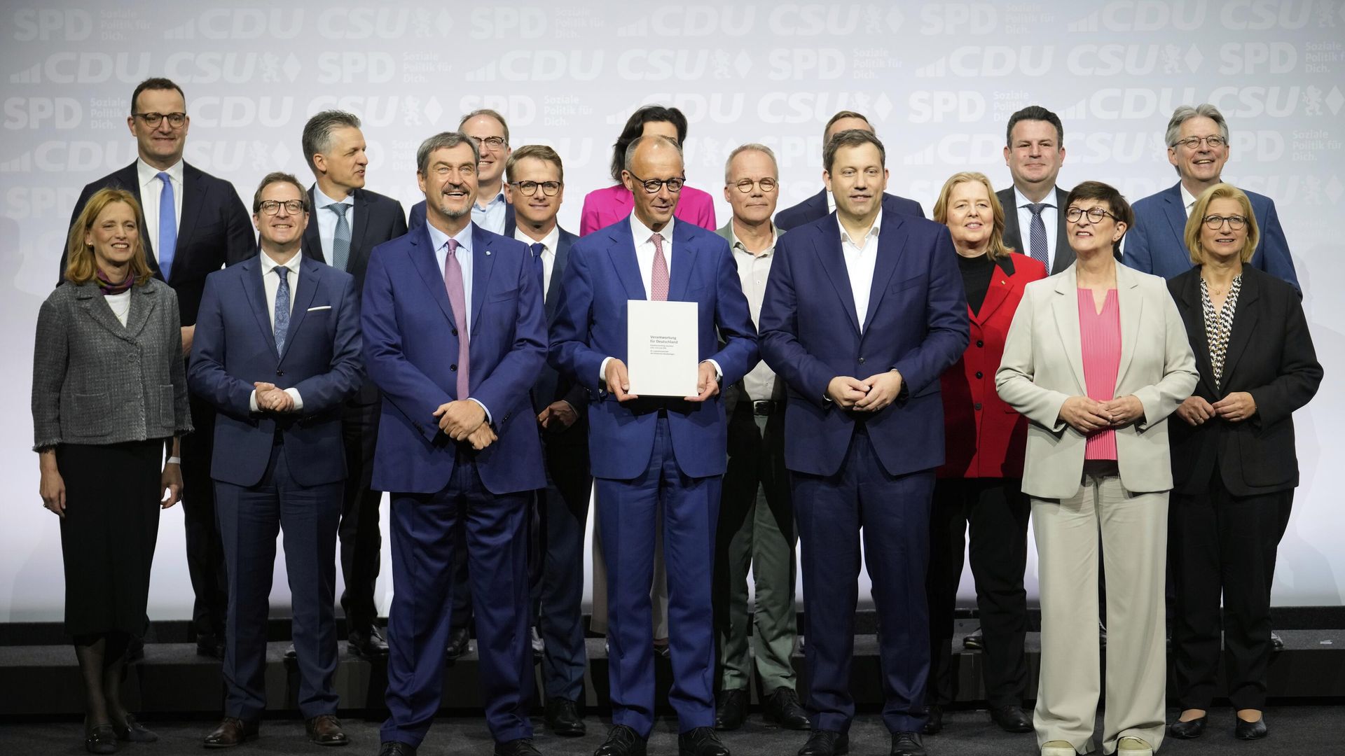 CSU leader Markus Soeder, CDU leader Friedrich Merz, SPD leader Lars Klingbeil and SPD Chairwoman Saskia Esken, front row from left, stand together with the new ministers after signing the coalition treaty in Berlin, Germany, Monday, May 5, 2025.  - Sputnik International, 1920, 05.05.2025