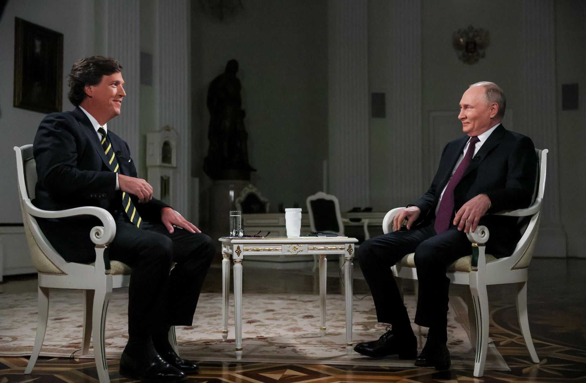 Russian President Vladimir Putin and US journalist Tucker Carlson. File photo - Sputnik International, 1920, 07.05.2025