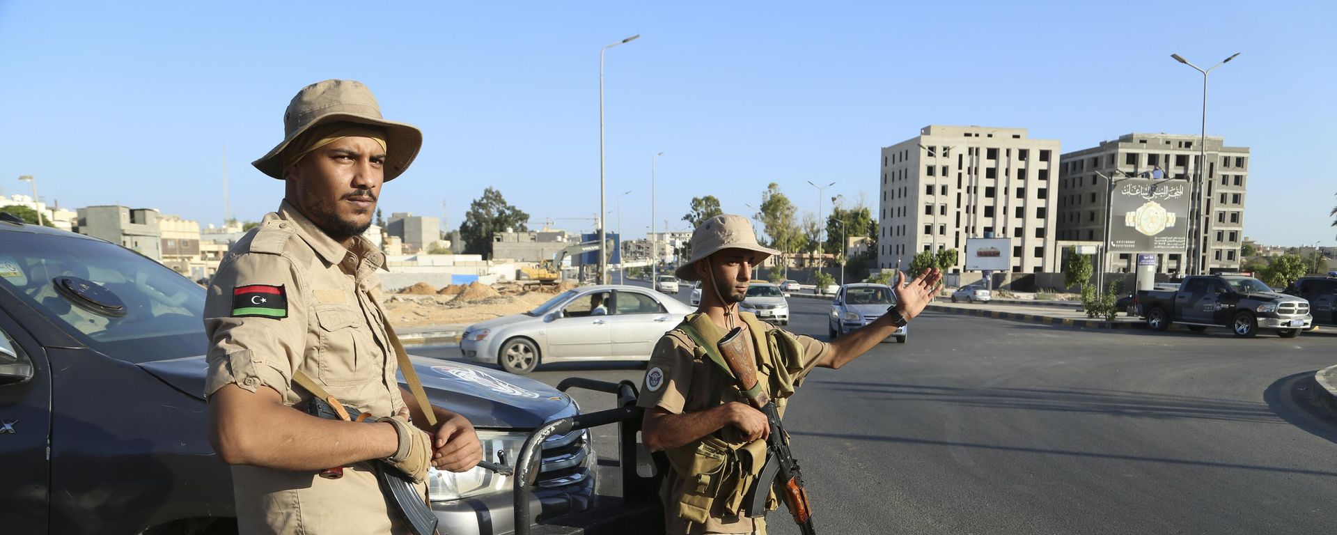 Libyan security forces stand guard in Tripoli, Libya, Tuesday, Aug. 16, 2023 - Sputnik International, 1920, 14.05.2025