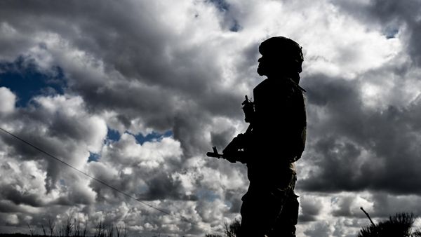 A sapper of the 92th Engineer Regiment of the Russian Armed Forces inspects an area for mines and explosive devices amid Russia's military operation in Ukraine, in Kursk region, Russia. - Sputnik International