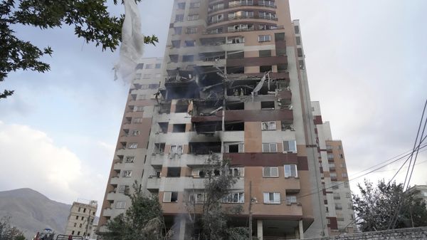 Damages are seen in a building after an explosion in a residence compound after Israel attacked Iran's capital Tehran, Friday, June 13, 2025.  - Sputnik International