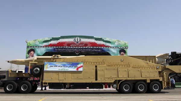 Sejjil, a surface-to-surface, a two-stage, solid-fuel ballistic missile is showcased during an annual military parade in Tehran, Iran, Sunday, Sept, 22, 2013 - Sputnik International