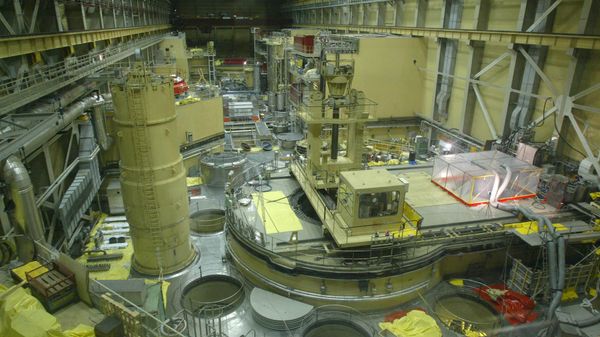 Plastic tent, right, covers the cleaning apparatus of Reactor Block 2 of the Paks Nuclear Power Plant to catch the small amount of still leaking radioactive gas in Paks, some 90 kms south of Budapest, Hungary on Tuesday, April 22, 2003 - Sputnik International