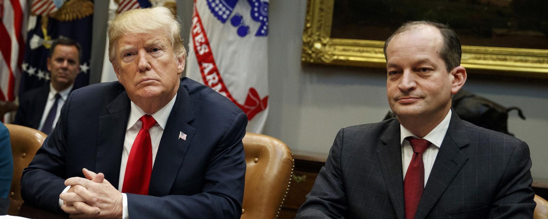 In this Sept. 17, 2018, file photo, President Donald Trump, left, and Labor Secretary Alexander Acosta listen during a meeting of the President's National Council of the American Worker in the Roosevelt Room of the White House in Washington - Sputnik International, 1920, 19.07.2025