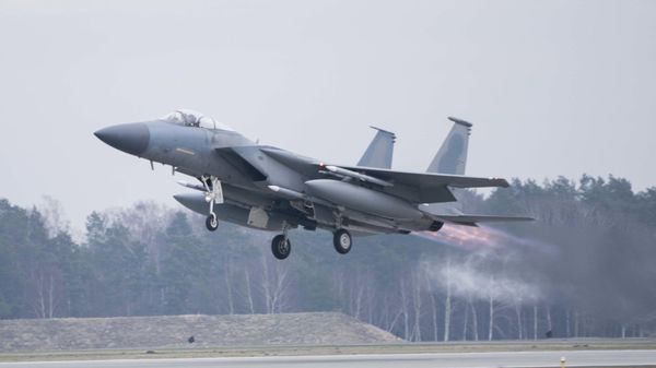 In this image provided by the US Air Force, a US Air Force F-15C Eagle assigned to the 493rd Fighter Squadron, Royal Air Force (RAF) Lakenheath, takes off in support of North Atlantic Treaty Organization enhanced air policing missions with the Polish Air Force at Lask Air Base, Poland, Feb. 15, 2022 - Sputnik International