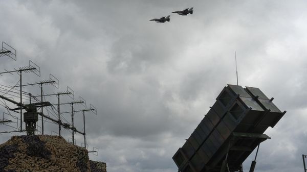 Ukrainian Air Force's F-16 fighter jets fly over a Patriot Air and Missile Defense System in an undisclosed location in Ukraine, Sunday, Aug. 4, 2024. - Sputnik International