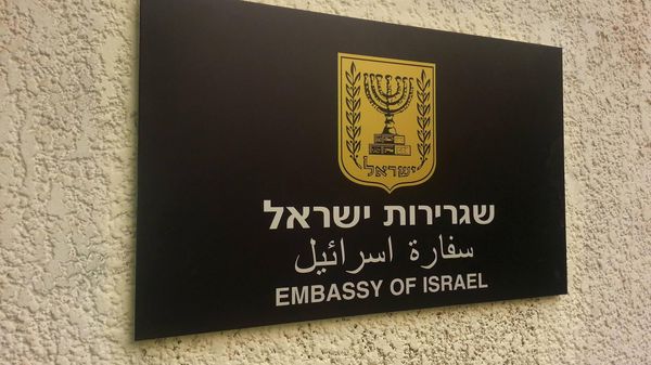 The sign posted outside during the re-opening of the embassy in Cairo, Egypt, four years after an Egyptian mob ransacked the site where the mission was previously located - Sputnik International