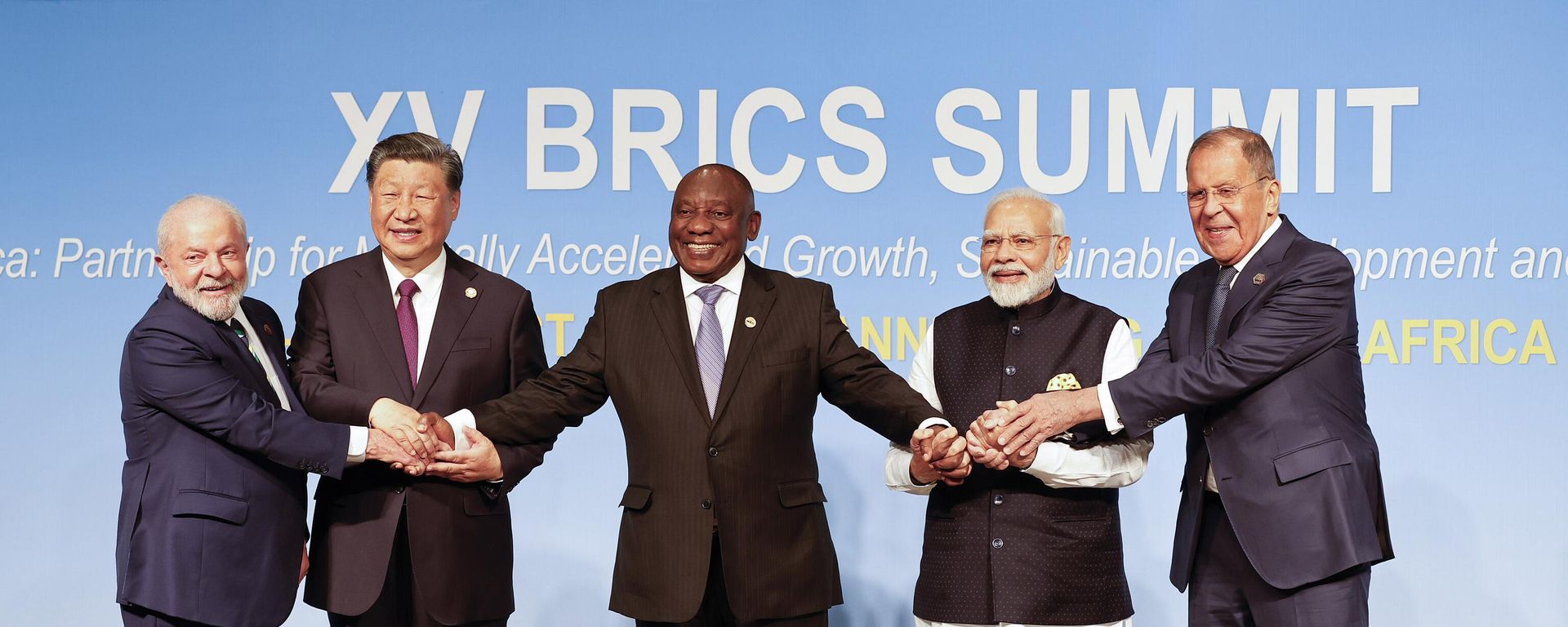 From left, Brazil President Luiz Inacio Lula da Silva, China President Xi Jinping, South African President Cyril Ramaphosa, Prime Minister of India Narendra Modi and Russia's Foreign Minister Sergei Lavrov pose for a BRICS family photo during the 2023 BRICS Summit at the Sandton Convention Centre in Johannesburg, South Africa, Wednesday, Aug. 23, 2023.  - Sputnik International, 1920, 07.08.2025