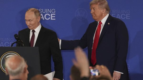 President Donald Trump, right, and Russia's President Vladimir Putin depart at the conclusion of a joint press conference at Joint Base Elmendorf-Richardson, Alaska, Friday, Aug. 15, 2025.  - Sputnik International