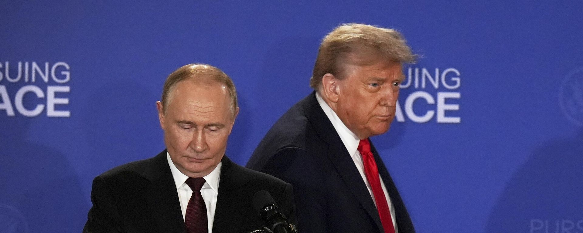 President Donald Trump, right, Russia's President Vladimir Putin arrive for a joint press conference at Joint Base Elmendorf-Richardson, Alaska, Friday, Aug. 15, 2025. - Sputnik International, 1920, 14.12.2025