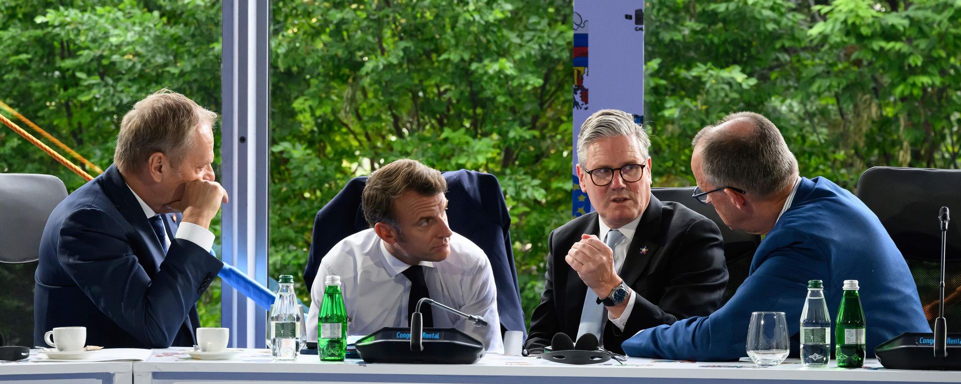 From left, Poland's Prime Minister Donald Tusk, France's President Emmanuel Macron, Britain's Prime Minister Keir Starmer and Germany's Chancellor Friedrich Merz speak during the Ukraine security meeting at the 6th European Political Community summit Friday May 16, 2025 in Tirana, Albania. (Leon Neal/Pool via AP) - Sputnik International, 1920, 27.02.2026