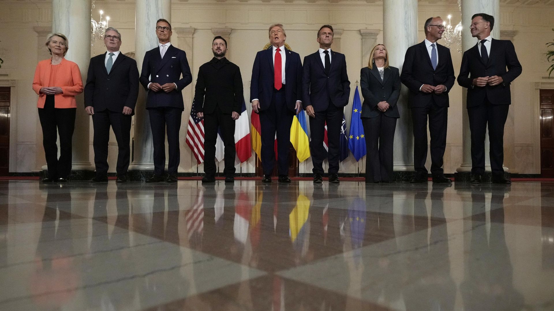 European Commission President Ursula von der Leyen, from left, British Prime Minister Keir Starmer, Finland's President Alexander Stubb, Ukraine's Volodymyr Zelensky, President Donald Trump, France's President Emmanuel Macron, Italy's Prime Minister Giorgia Meloni, Germany's Chancellor Friedrich Merz and NATO Secretary General Mark Rutte pose for a group photo in the Grand Foyer of the White House, Monday, Aug. 18, 2025, in Washington. European Commission President Ursula von der Leyen, from left, British Prime Minister Keir Starmer, Finland's President Alexander Stubb, Ukraine's Volodymyr Zelensky, President Donald Trump, France's President Emmanuel Macron, Italy's Prime Minister Giorgia Meloni, Germany's Chancellor Friedrich Merz and NATO Secretary General Mark Rutte pose for a group photo in the Grand Foyer of the White House, Monday, Aug. 18, 2025, in Washington. - Sputnik International, 1920, 18.08.2025