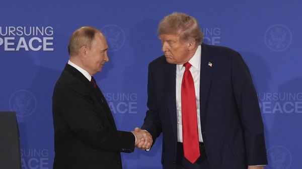 US President Donald Trump, right, shakes the hand of Russia's President Vladimir Putin during a joint press conference at Joint Base Elmendorf-Richardson, Alaska, Friday, Aug. 15, 2025.  - Sputnik International