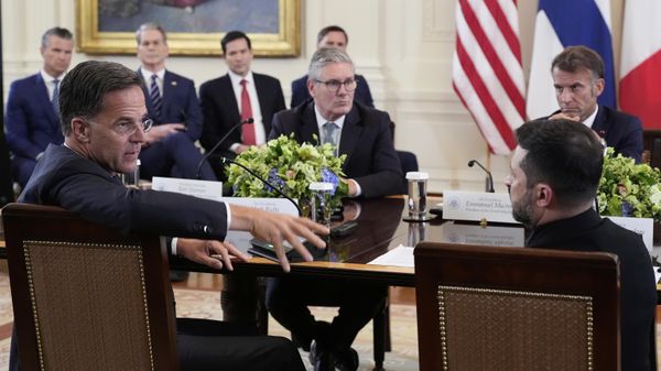 NATO Secretary General Mark Rutte, foreground left, speaks as Ukrainian President Volodymyr Zelenskyy, foreground right, British Prime Minister Keir Starmer, center left, and France's President Emmanuel Macron, center right - Sputnik International