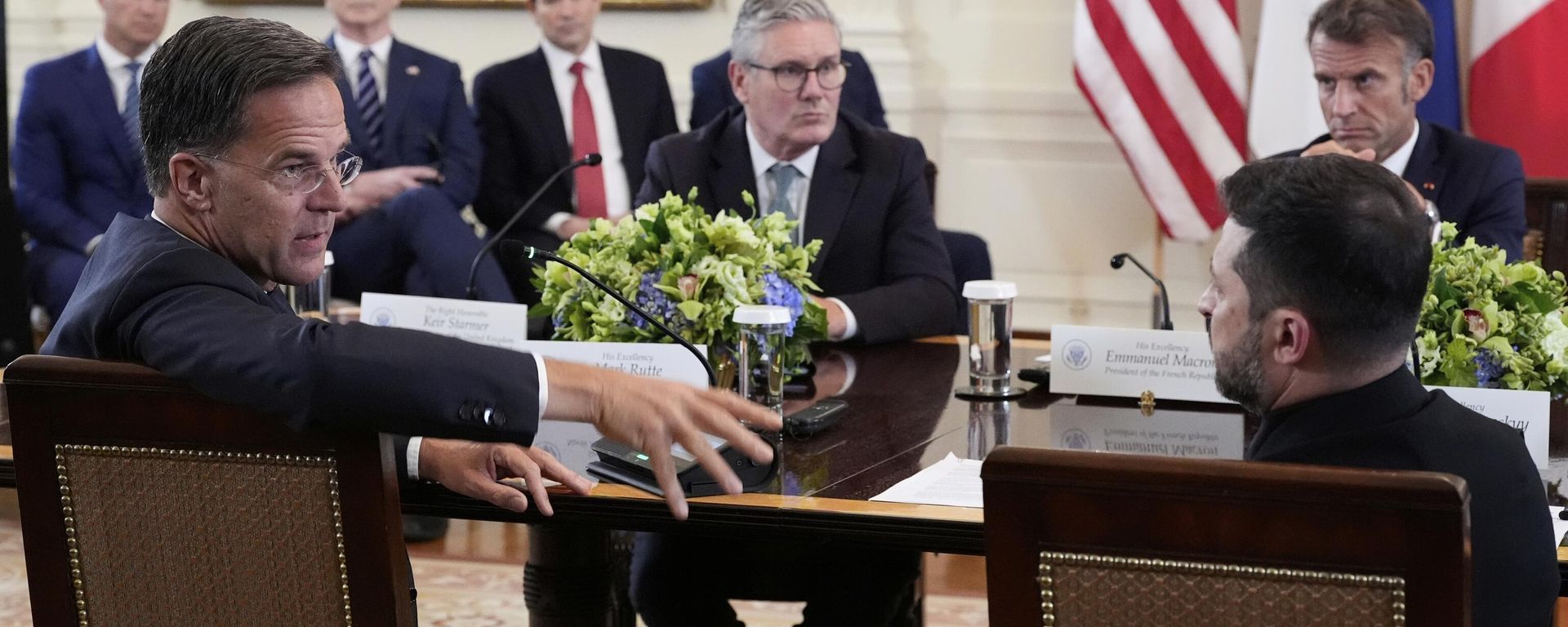NATO Secretary General Mark Rutte, foreground left, speaks as Ukrainian President Volodymyr Zelenskyy, foreground right, British Prime Minister Keir Starmer, center left, and France's President Emmanuel Macron, center right NATO Secretary General Mark Rutte, foreground left, speaks as Ukrainian President Volodymyr Zelenskyy, foreground right, British Prime Minister Keir Starmer, center left, and France's President Emmanuel Macron, center right - Sputnik International, 1920, 30.10.2025