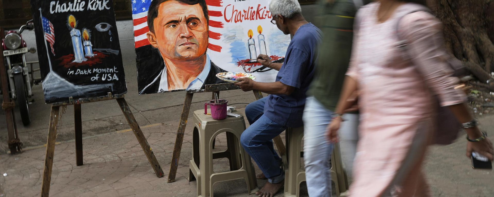 A teacher from Gurukul school of Art completes artwork to pay tribute to Charlie Kirk who was shot and killed, in Mumbai, India, Thursday, Sept. 11, 2025. A teacher from Gurukul school of Art completes artwork to pay tribute to Charlie Kirk who was shot and killed, in Mumbai, India, Thursday, Sept. 11, 2025. - Sputnik International, 1920, 12.09.2025
