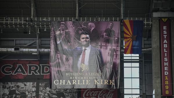 A banner for conservative activist Charlie Kirk is seen during a memorial service for Kirk - Sputnik International