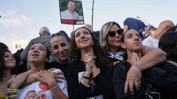 People react in anticipation of the release of Israeli hostages held in Gaza during a gathering at a plaza known as hostages square in Tel Aviv, Israel, Monday, Oct. 13, 2025.  - Sputnik International
