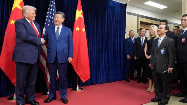 President Donald Trump, left, and Chinese President Xi Jinping shake hands before their meeting at Gimhae International Airport in Busan, South Korea, Thursday, Oct. 30, 2025.  - Sputnik International