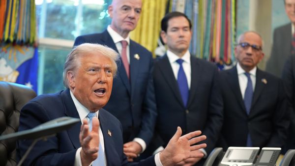 President Donald Trump answers questions from reporters during a meeting with the White House task force on the 2026 FIFA World Cup in the Oval Office of the White House, Monday, Nov. 17, 2025 - Sputnik International