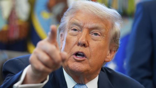 President Donald Trump answers questions from reporters during a meeting with the White House task force on the 2026 FIFA World Cup in the Oval Office of the White House, Monday, Nov. 17, 2025, in Washington - Sputnik International