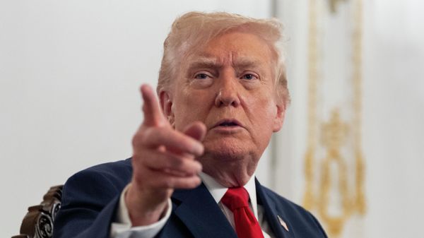 President Donald Trump speaks to reporters after speaking to troops via video from his Mar-a-Lago estate on Thanksgiving, Thursday, Nov. 27, 2025, in Palm Beach, Fla - Sputnik International