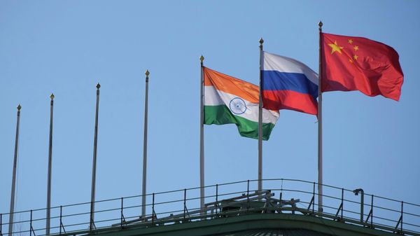 The flags of India, Russia and China in St. Petersburg, Russia. File photo - Sputnik International