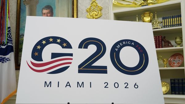 A sign for the G20 to be hosted in Miami in 2026 is displayed as President Donald Trump speaks in the Oval Office of the White House, Friday, Sept. 5, 2025, in Washington. - Sputnik International