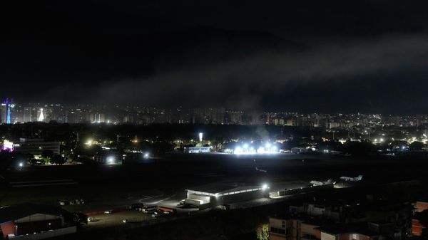 Smoke raises at La Carlota airport after explosions and low-flying aircraft were heard in Caracas, Venezuela, Saturday, Jan. 3, 2026.  - Sputnik International