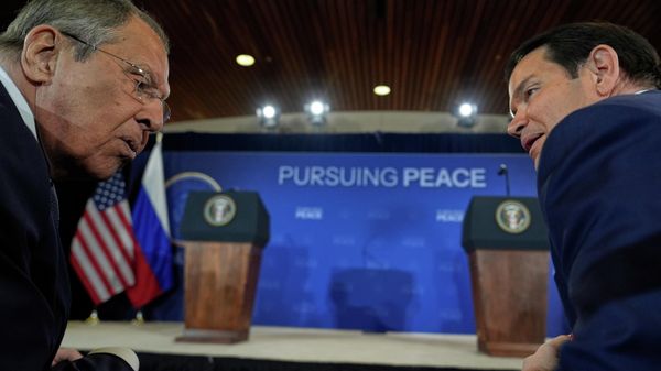 Russia's Foreign Minister Sergey Lavrov and Secretary of State Marco Rubio talks before a news conference with President Donald Trump and Russia's President Vladimir Putin at Joint Base Elmendorf-Richardson, Alaska, Friday, Aug. 15, 2025. - Sputnik International