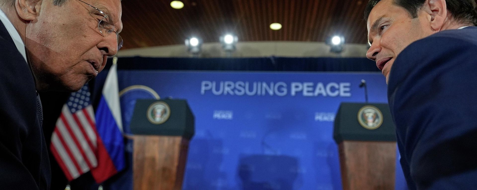 Russia's Foreign Minister Sergey Lavrov and Secretary of State Marco Rubio talks before a news conference with President Donald Trump and Russia's President Vladimir Putin at Joint Base Elmendorf-Richardson, Alaska, Friday, Aug. 15, 2025. - Sputnik International, 1920, 20.01.2026