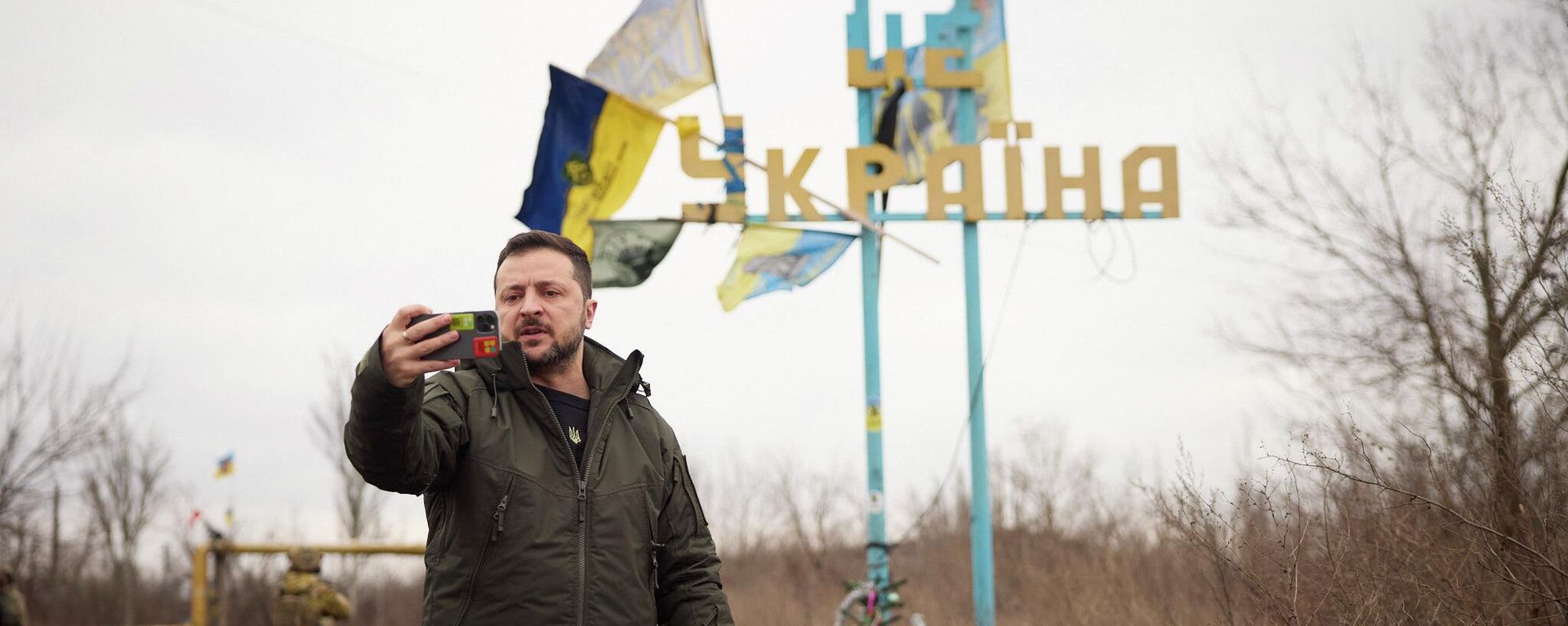 In this photo provided by the Ukrainian Presidential Press Office, Volodymyr Zelensky visits Avdiyevka, Ukrainian-occupied Donetsk, Ukraine, Friday, Dec. 29, 2023. Russian forces took the town two months later. - Sputnik International, 1920, 23.01.2026