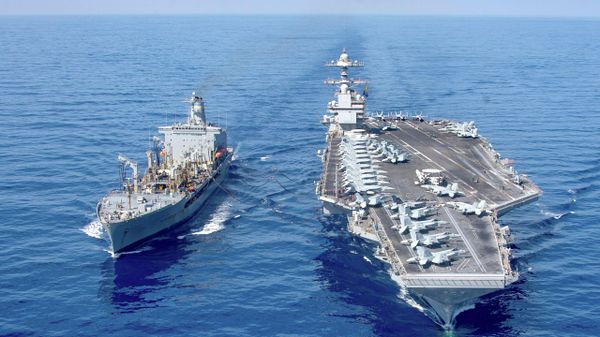 USS Gerald R. Ford aircraft carrier refuels from the underway replenishment oiler USNS Laramie in the eastern Mediterranean Sea, Oct. 11, 2023 - Sputnik International