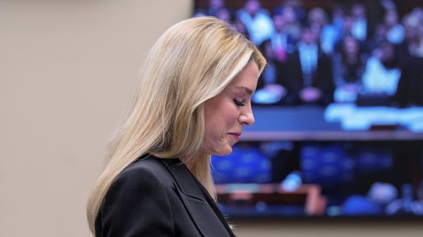 Attorney General Pam Bondi, the nation's top law enforcement officer, smiles as she prepares to face questions in the House Judiciary Committee over the Justice Department's handling of files related to convicted sex offender Jeffrey Epstein that have exposed sensitive private information about victims despite redaction efforts, at the Capitol in Washington, Wednesday, Feb. 11, 2026 - Sputnik International