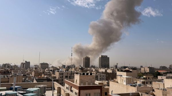 Smoke rises on the skyline after an explosion in Tehran, Iran, Saturday, Feb. 28, 2026.(AP Photo) - Sputnik International