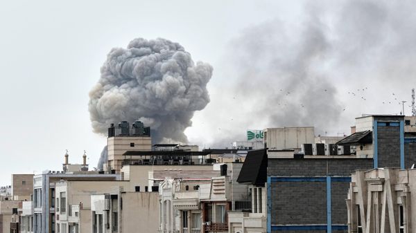 A plume of smoke rises after a strike in Tehran, Iran, Monday, March 2, 2026. (AP Photo/Vahid Salemi) - Sputnik International