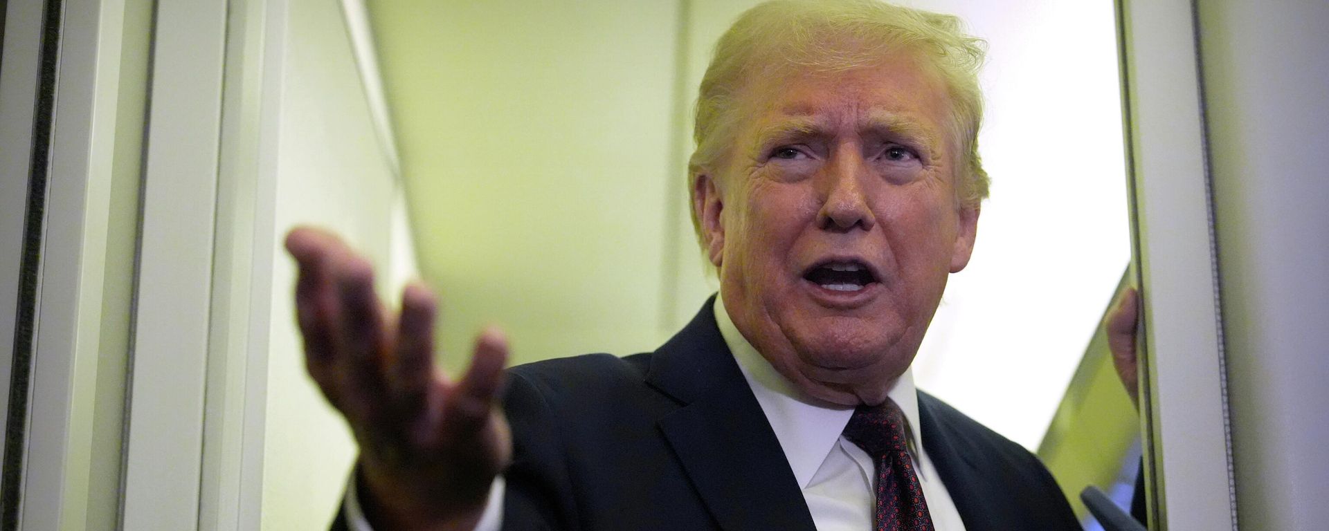President Donald Trump speaks to reporters aboard Air Force One, Sunday, March 15, 2026, en route from West Palm Beach, Fla. to Joint Base Andrews, Md. - Sputnik International, 1920, 26.05.2026