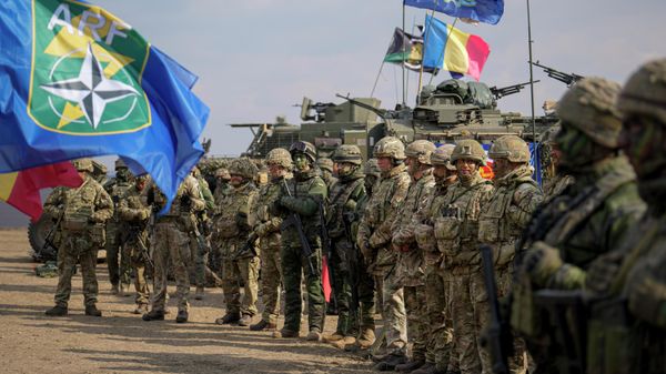 Servicemen stand at the end of the Steadfast Dart 2025 NATO exercise. File photo - Sputnik International