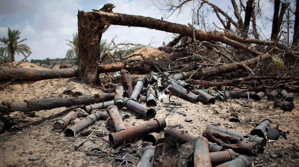 Fired ammunition lays on the ground near Libyan army tanks destroyed by NATO air strikes some kilometers before the east front line with Muammar Gaddafi forces, 25 km, 16 miles, from Misrata, Libya, May 25, 2011.  - Sputnik International