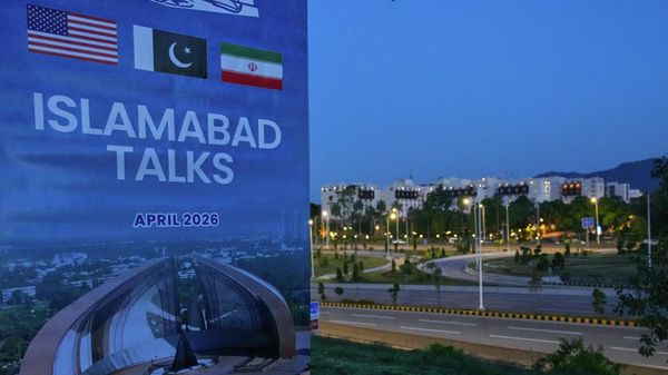 A billboard of the U.S. Iran talks is seen near Serena Hotel, the venue for the U.S. Iran officials meeting, in Islamabad, Pakistan, Sunday, April 12, 2026. (AP Photo/Anjum Naveed) - Sputnik International
