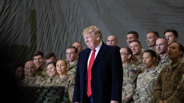 In this Nov. 28, 2019, file photo President Donald Trump smiles before addressing members of the military during a surprise Thanksgiving Day visit at Bagram Air Field, Afghanistan - Sputnik International