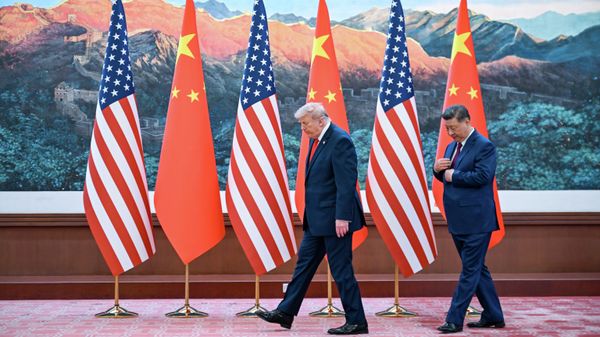 Chinese President Xi Jinping, right, and US President Donald Trump meet at the Great Hall of the People in Beijing,  May 14, 2026.  - Sputnik International