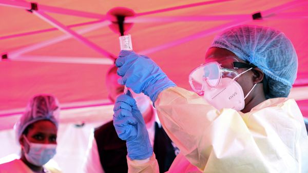 A health worker prepares to administer a vial of a vaccine against the Sudan strain of Ebola, during a trial, at Mulago Referral Hospital, in Kampala, Uganda Monday, Feb. 3, 2025 - Sputnik International