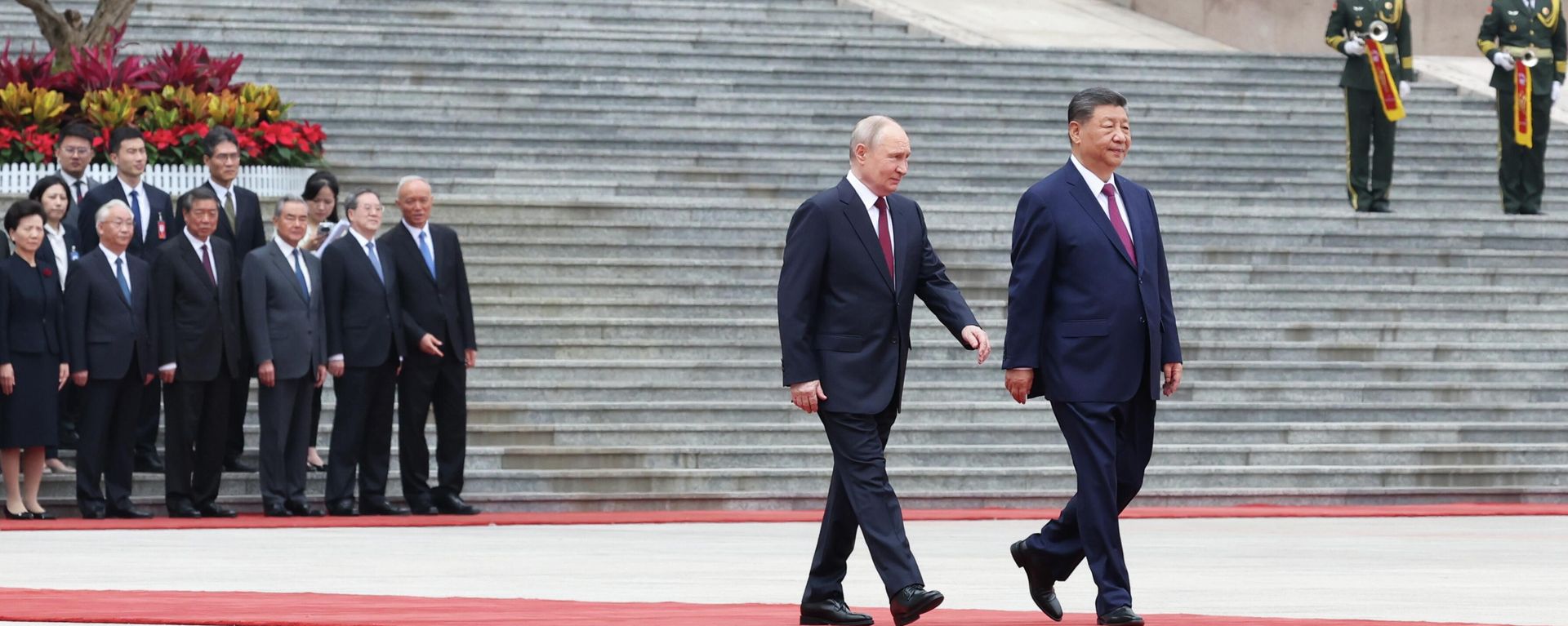 Russian President Vladimir Putin and Chinese President Xi Jinping Russian President Vladimir Putin and Chinese President Xi Jinping - Sputnik International, 1920, 20.05.2026