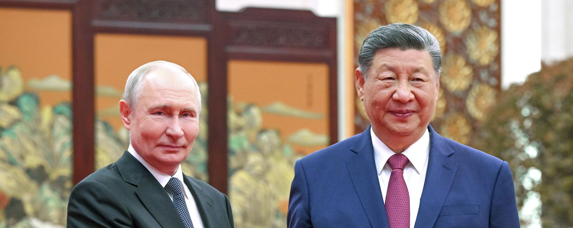 Russian President Vladimir Putin and Chinese President Xi Jinping drink tea during a meeting at the Great Hall of the People in Beijing. - Sputnik International, 1920, 02.09.2026