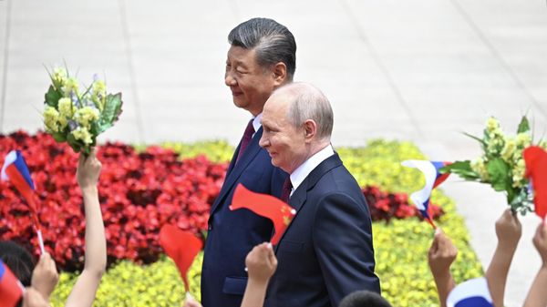 Russian President Vladimir Putin and Chinese President Xi Jinping during a meeting in Beijing. - Sputnik International